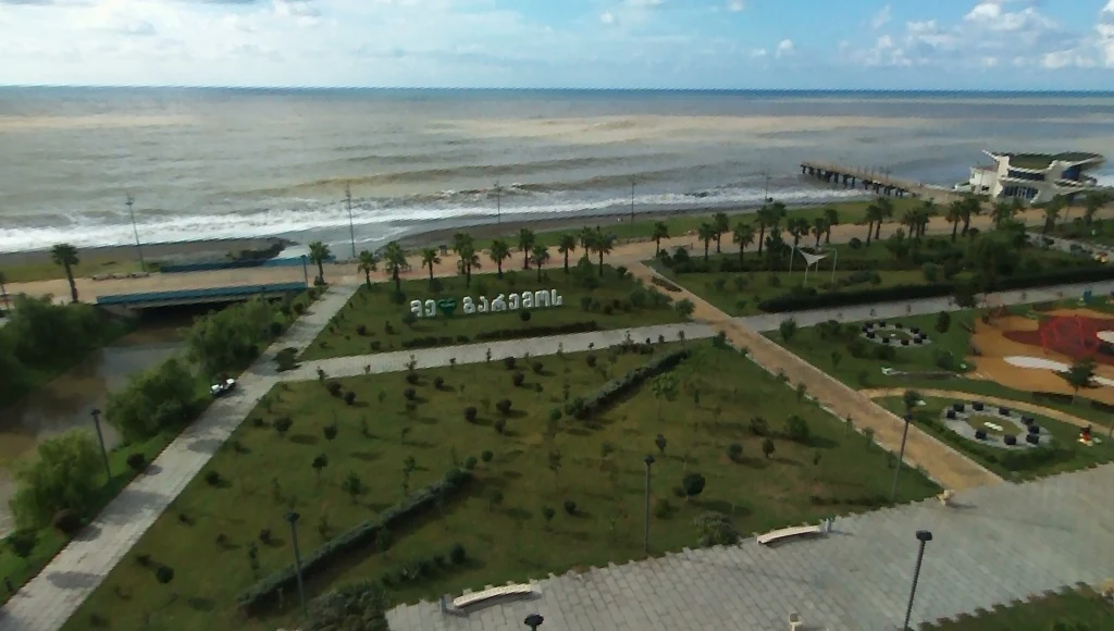 Palm-lined promenade and beach along the Black Sea coast at Batumi.
