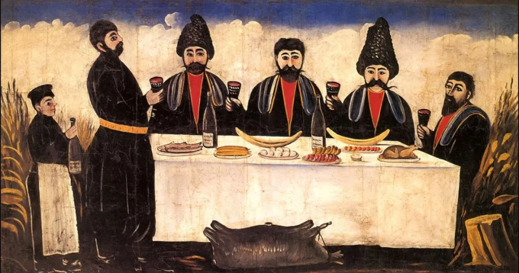 A traditional Georgian supra feast, depicted by painter Pirosmani, showcasing local wine and food culture.