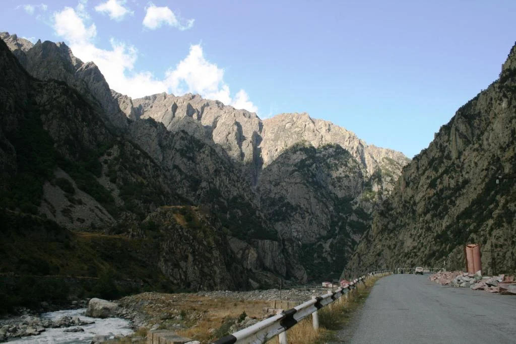 The Georgian Military Highway winds through the dramatic Dariali Gorge near Kazbegi, the main overland route.