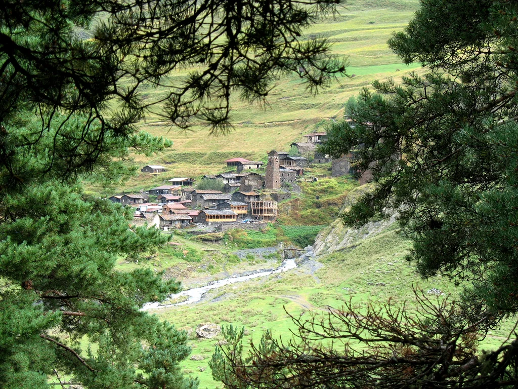 Dartlo village in Tusheti, with its stone towers seen above the Didkhevi river.
