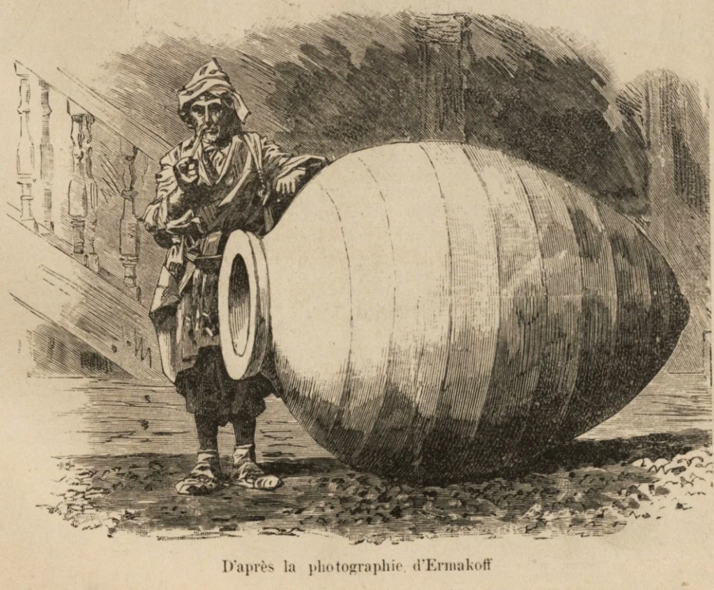 A 19th-century illustration shows a man with a giant qvevri, the clay vessel used for ancient Georgian winemaking.