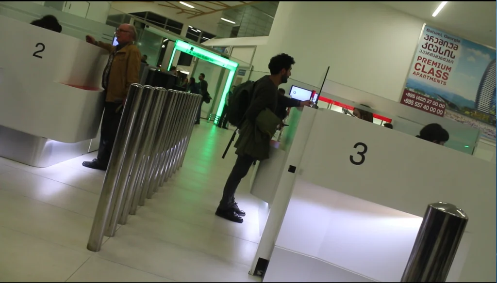 A passenger has his passport checked at an automated border gate at Kutaisi Airport.
