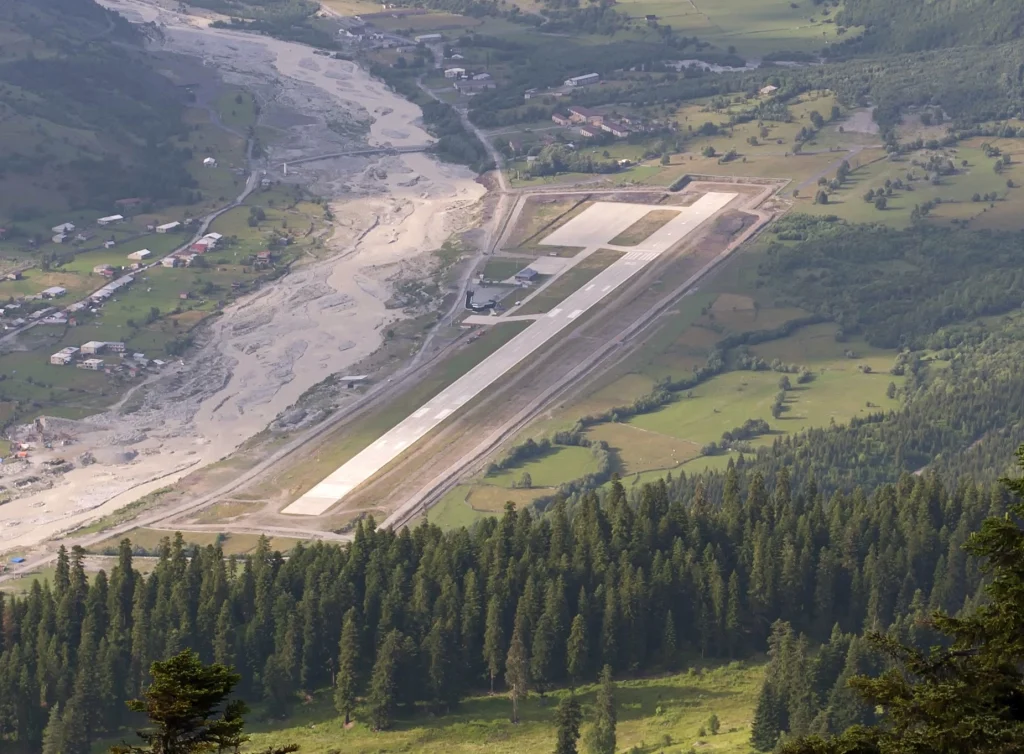The runway at Mestia's Queen Tamar Airport amid the Svaneti mountains.