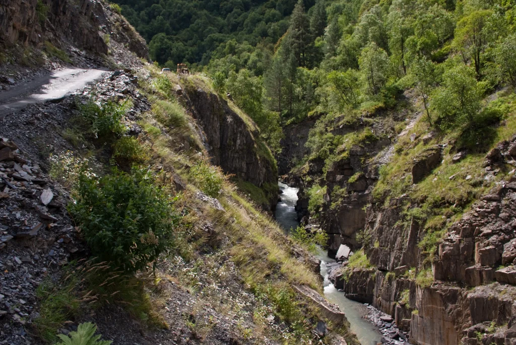 The unpaved road to Ushguli winds through Svaneti's valleys, often requiring a 4x4 vehicle.