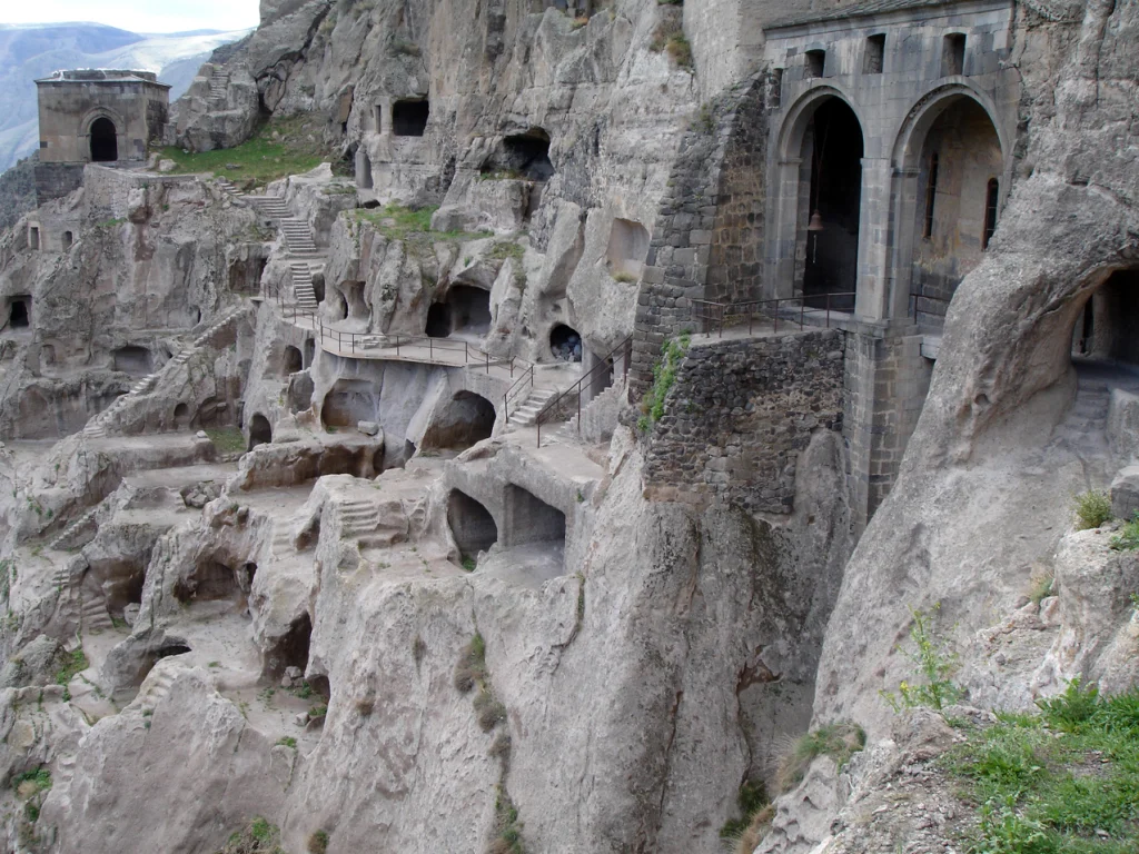 The cliffside cave monastery of Vardzia, a historic Georgian landmark near Tbilisi excursions.